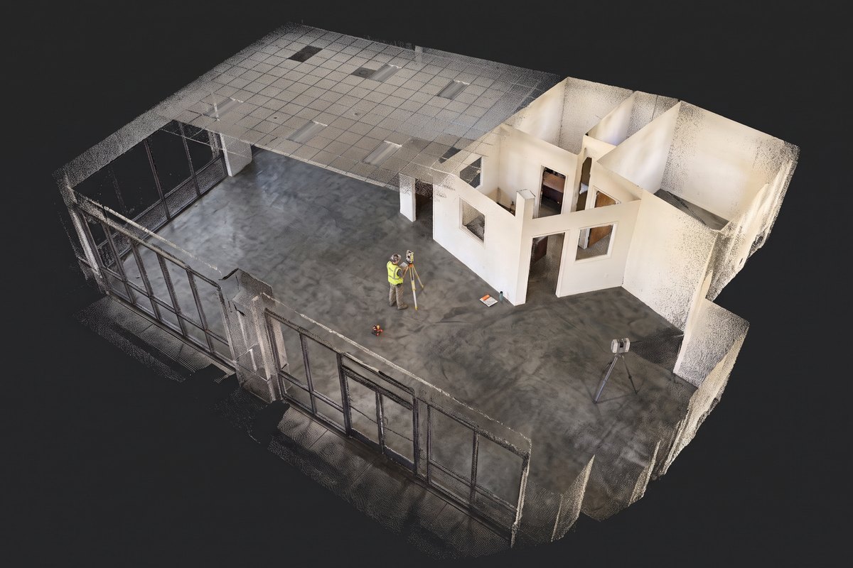 Cutaway view of a 3D laser scan point cloud of a commercial interior, partition walls and ceiling visible