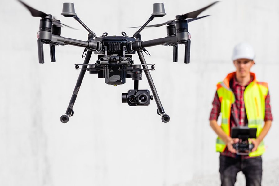 Survey drone in flight with a certified remote pilot at the controls